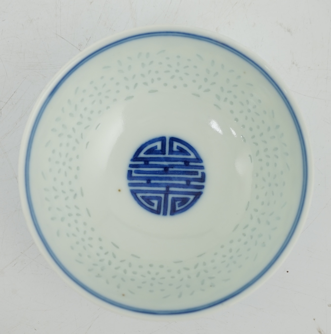 A Chinese blue and white ‘rice grain’ bowl, Jiaqing mark and possibly of the period